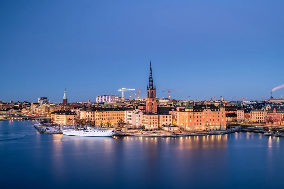 The skyline of Stockholm across the water in soft light