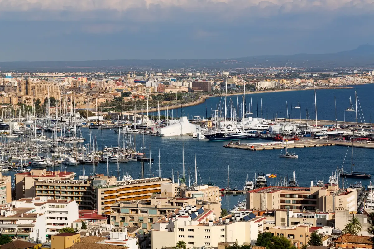 Yachts in the port of Palma with the city and the cathedral behind