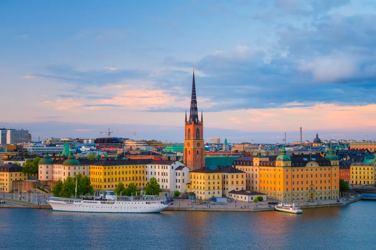 Stockholm’s old town Gamla Stan and Riddarholmen church across the water in evening light